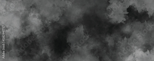 Distressed and cloudy black and white watercolor texture with an aged vintage feel

