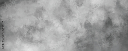 Faded and weathered ink wash texture with an abstract cloudy black and gray watercolor effect


