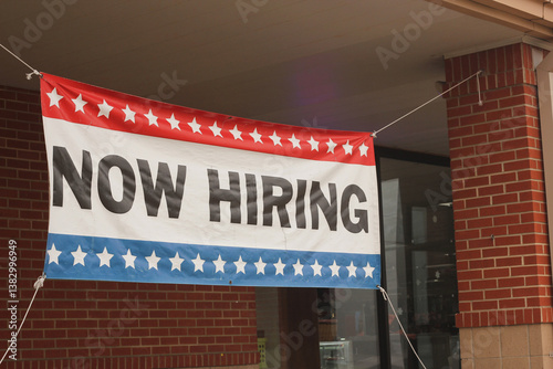 Now Hiring Sign on Front of Retail Business