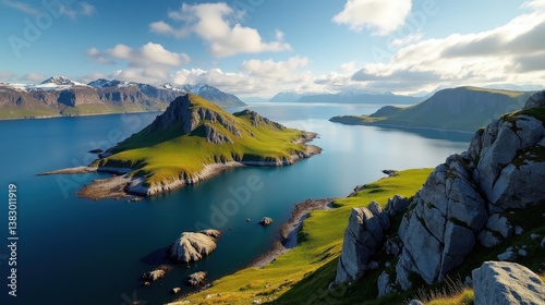 A view from above of Bjørnøya (Bear Island) in Norway during midday, featuring sunny weather and wild landscapes.