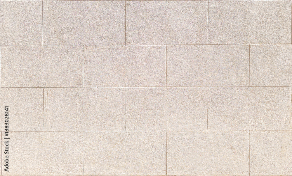 Fototapeta premium Modèle de mur en enduit décoratif imitant des blocs de pierres