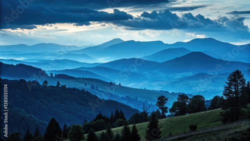 Tranquil blue mountain silhouettes grace this artistic digital landscape painting.