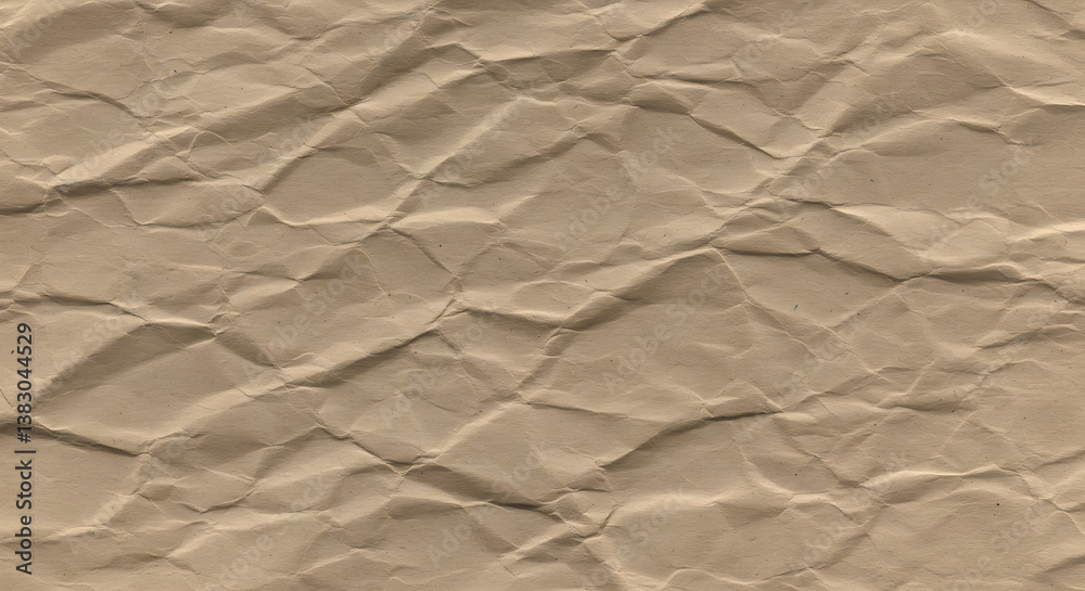 Recycled kraft paper with a rough, wrinkled surface for artistic backgrounds. Recycled kraft paper with a rough, wrinkled surface for artistic backgrounds.