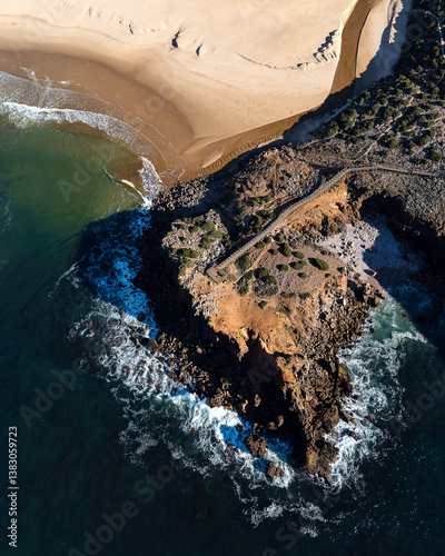 Aerial shot of Praia da Bordeira, on the coast of Algarve in Portugal