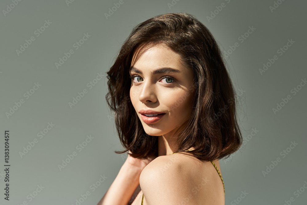 Naklejka premium Beautiful young woman radiates style and confidence in summer attire on a bright day