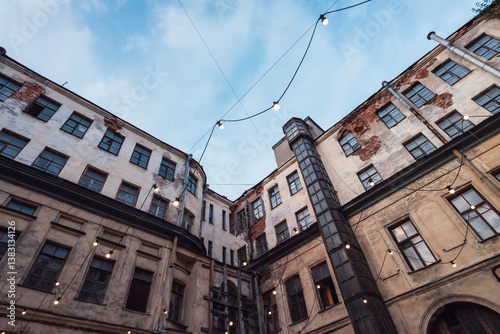 Decayed facade of old city buildings.