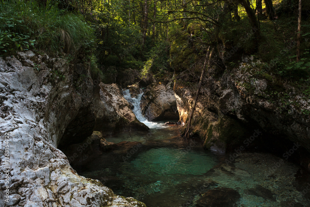 Beautiful water cascades or small waterfall in the valley of Lepena, Slovenia Beautiful water cascades or small waterfall in the valley of Lepena, Slovenia