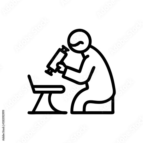 Scientist using microscope while seated at a table  