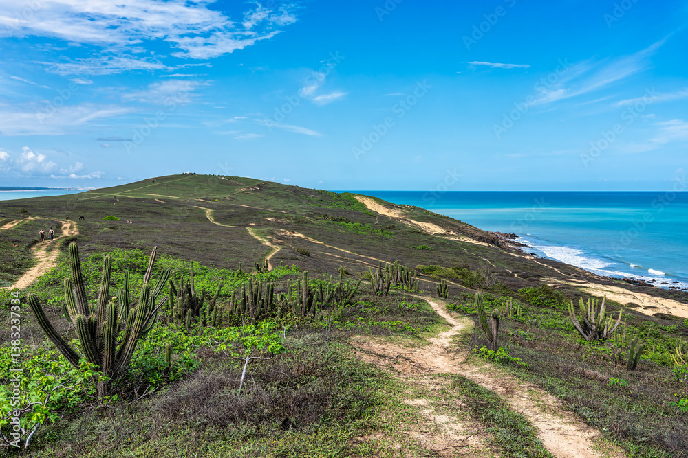 Trail along the coast and beaches from Jericoacoara to Pedra Furada in Ceara State, Brazil.