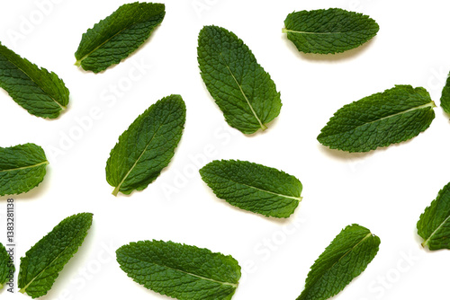 Fresh mint leaves are neatly arranged on a clean white background. The image conveys freshness, natural health benefits, and is perfect for themes like herbal tea, summer, and wellness.
