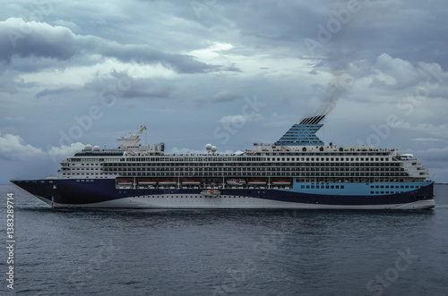 Obraz na płótnie Modern ruiseship cruise ship liner Explorer 2 anchored offshore of Zakynthos island in Greece during Aegean summer Greek Island cruising on cloudy day w salonie