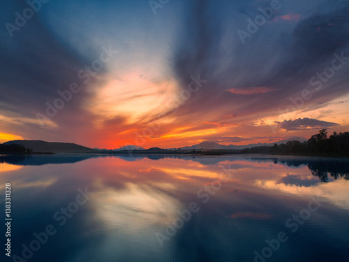Reflection of the morning sky at the pond