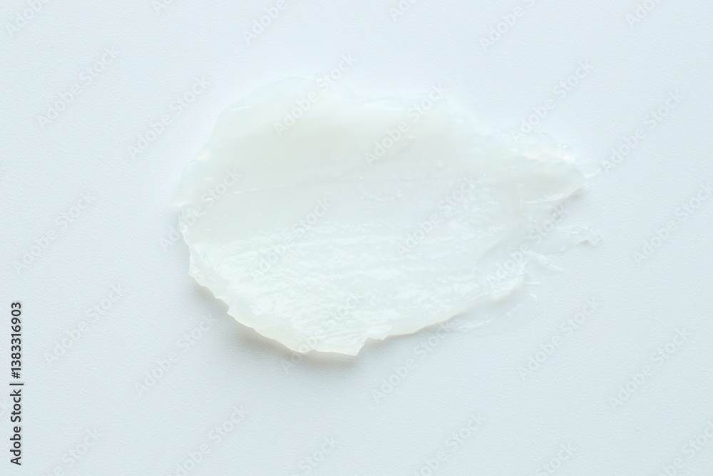 Moisturizing lip balm on white background, top view Moisturizing lip balm on white background, top view