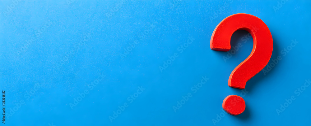 Photo of a question mark on a blue background, symbolizing the unknown and searching for an answer Photo of a question mark on a blue background, symbolizing the unknown and searching for an answer