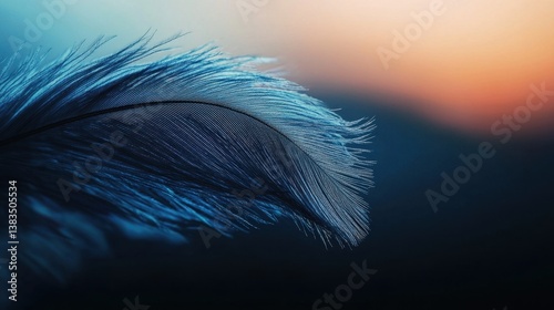 Vibrant blue feather with silky, delicate textures, glowing under warm natural light, highlighting fine details.