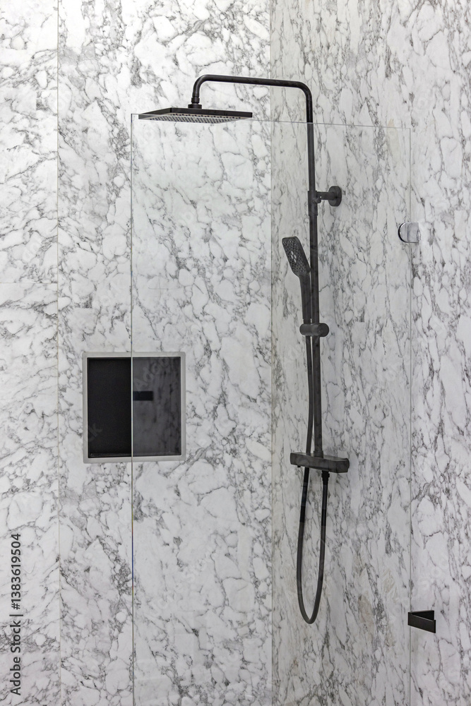 Black Shower Head at Holder in Marble Bathroom Modern Home
