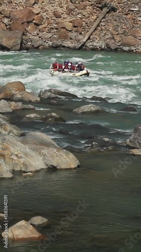 People Enjoying White Water Rafting on the Ganges River in Rishikesh, India
