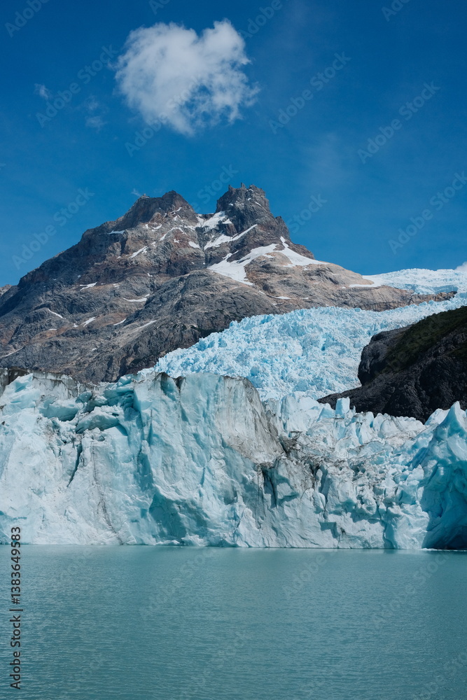 custom made wallpaper toronto digitalA breathtaking view of a massive glacier in El Calafate, Argentina, with icy blue hues and rugged formations, captured from a catamaran boat tour in Patagonia.