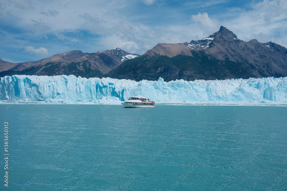 custom made wallpaper toronto digitalPerito Moreno Glacier from afar, shot from a boat — turquoise lake, icy blue glacier wall, catamaran for scale, and snow-covered mountains in Patagonia, Argentina.
