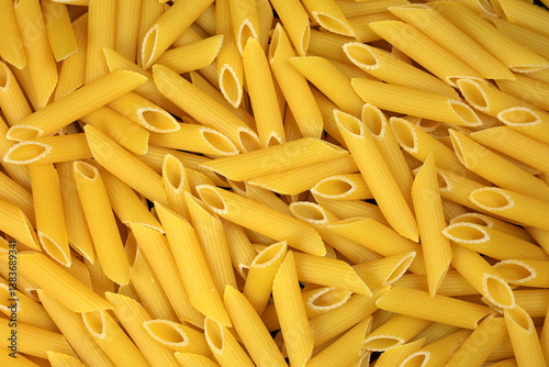 penne makarna - uncooked italian penne pasta background