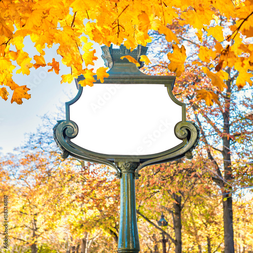 Obraz na płótnie Empty sign board frame white isolated in with autumn fall leaves w salonie