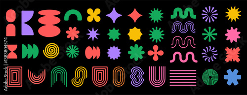 Vibrant collection of abstract geometric shapes in bright colors against a black background, including stars, spirals, and curves, arranged in a playful, modern grid pattern.