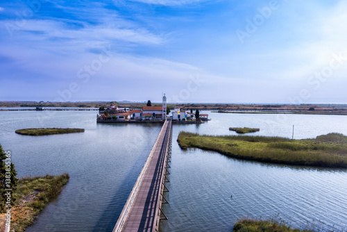 Wallpaper Mural Aerial view od Agios Nikolaos Monastery on the Vistonida Lake at Porto Lagos, Greece Torontodigital.ca