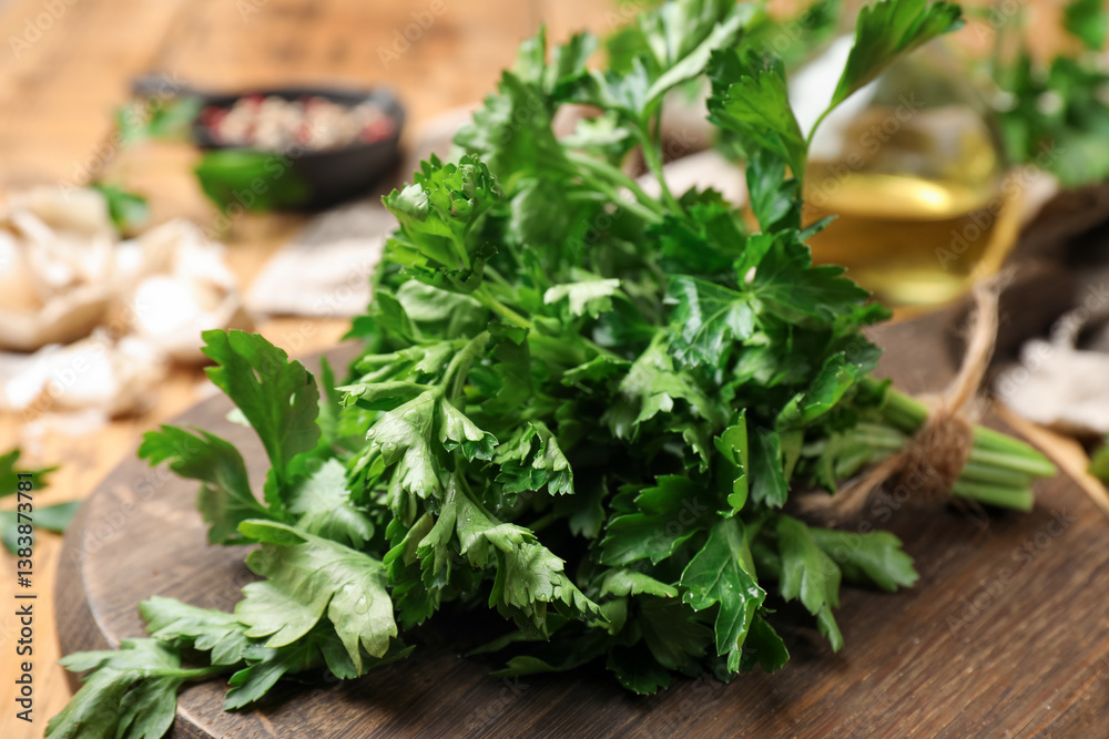 Bunch of fresh parsley on wooden table, closeup Bunch of fresh parsley on wooden table, closeup