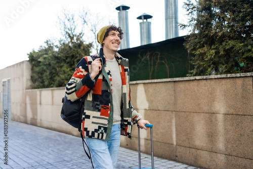 Businessman with suitcase enjoying outdoor travel experience