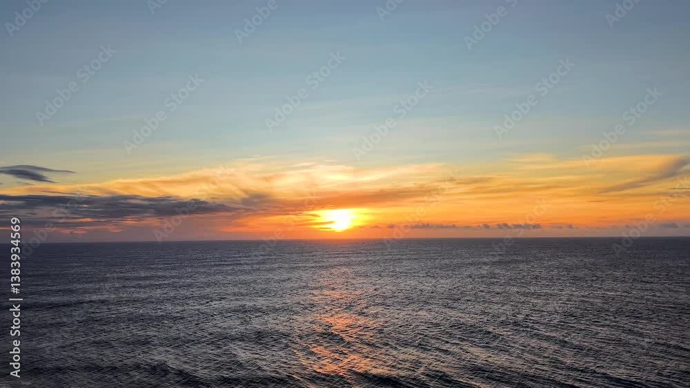 Serene Aerial View of Peaceful Ocean Waves Illuminated by Warm Evening Sunlight Serene Aerial View of Peaceful Ocean Waves Illuminated by Warm Evening Sunlight