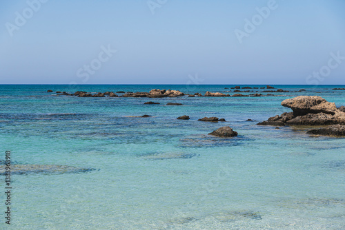 Fototapeta Naklejka Na Ścianę i Meble -  single stones on the sandy coast of the Mediterranean Sea on the island of Crete
