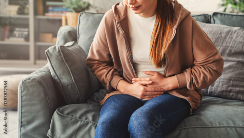 Foto Young woman with stomach ache