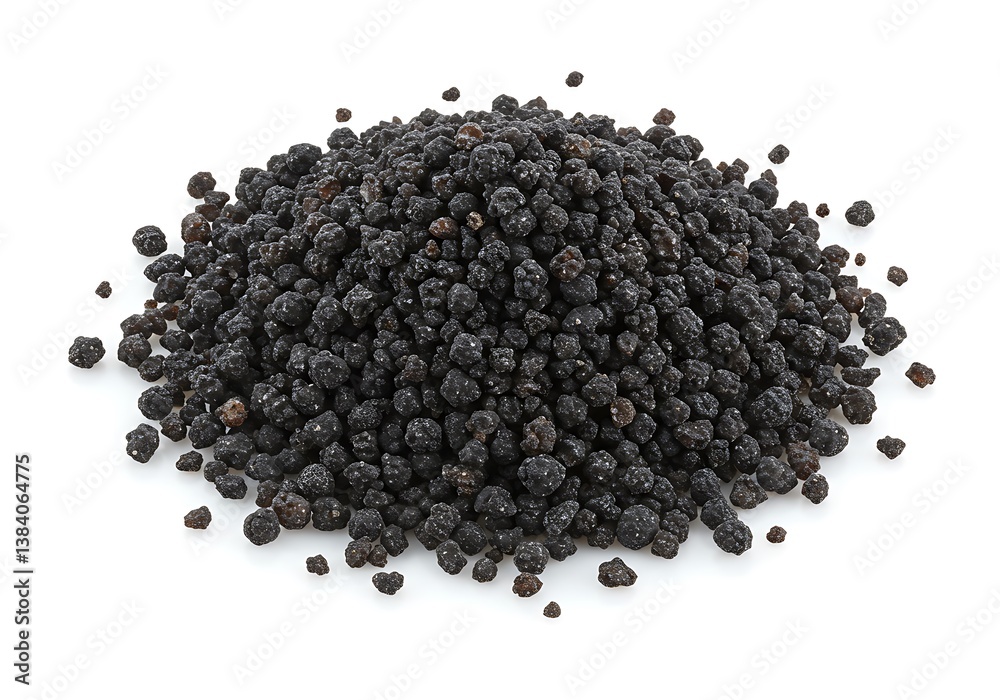 A pile of small dark round objects scattered on a white background. A pile of small dark round objects scattered on a white background.
