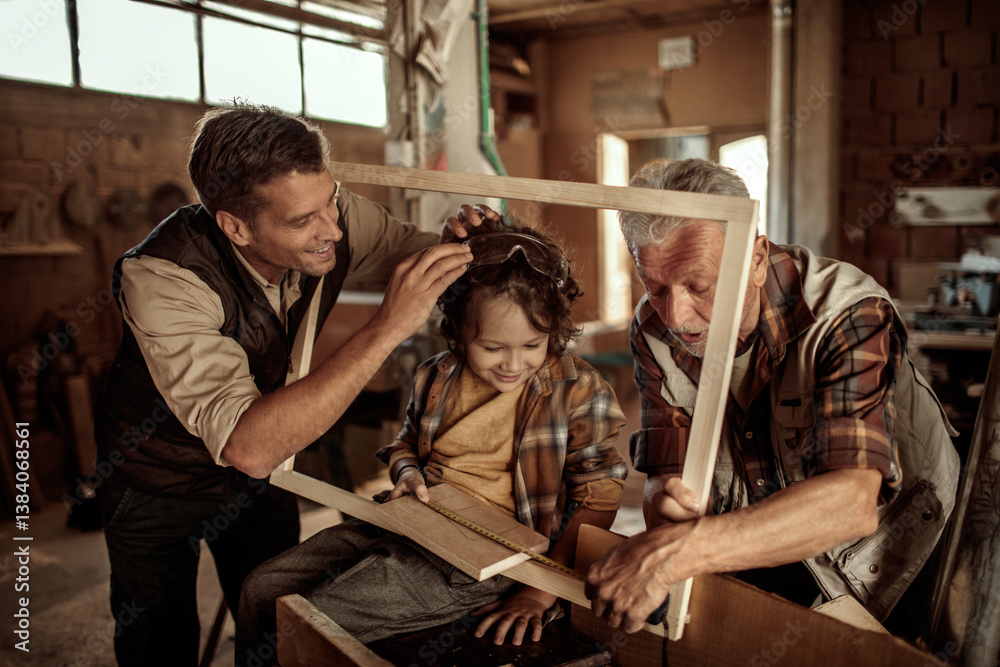 Three generations of men bonding in woodworking workshop Three generations of men bonding in woodworking workshop