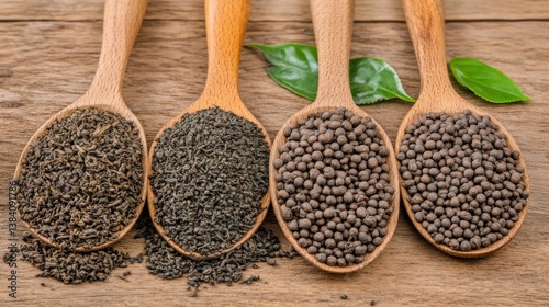 Assorted loose leaf teas in wooden spoons