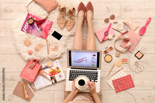 Woman with laptop, cup of c...