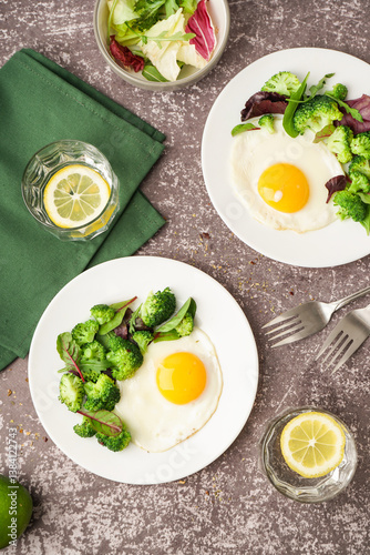 Plates with tasty fried egg...