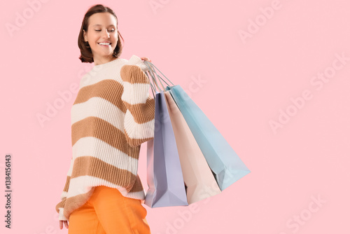 Young woman in warm sweater...