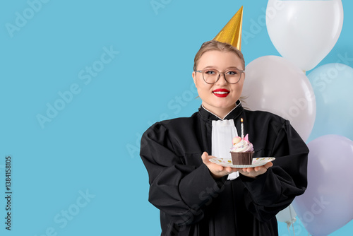Young happy female judge in...