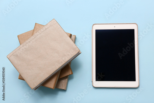 Books with modern tablet co...