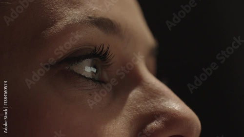 Close up portrait a woman speak on cell phone about work. Girl have call with client on background big city light. Business woman do business. Young woman talking on phone in apartment at night. 