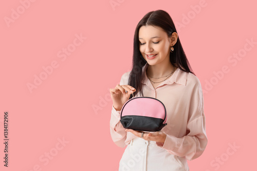 Teenage girl with cosmetic ...