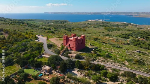 Drone view of Saint Agatha's Tower also known as the Red Tower in Mellieha city. Maltese island