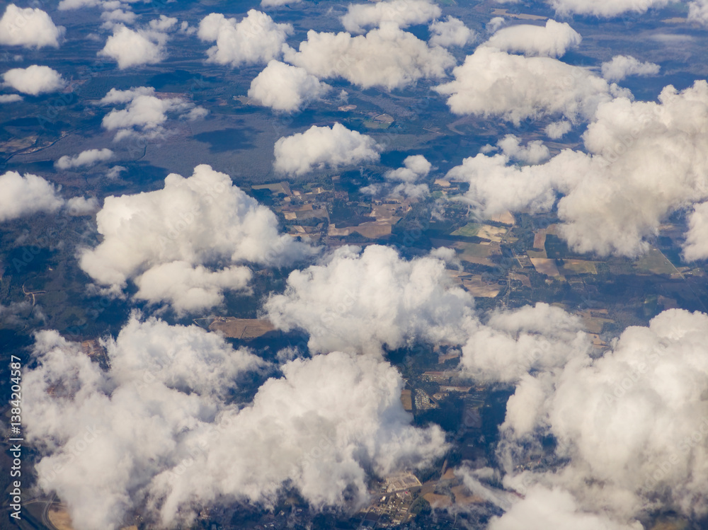 High altitude photograph of sky, clouds and landscape