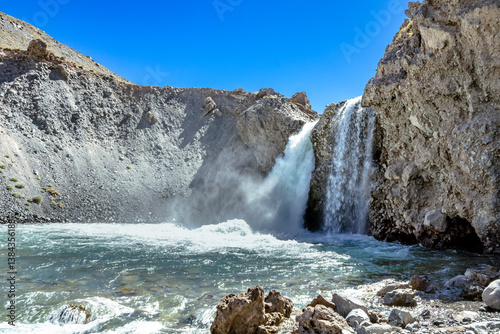 El Yeso Waterfall is a cascade located in Cajon del Maipo, Chile. This area is known for its stunning natural landscape and is a popular destination for those who enjoy hiking and nature. photo