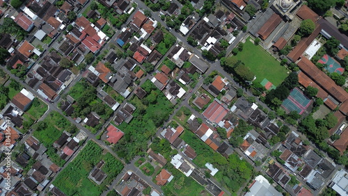 Aerial View of Indonesian Village with Traditional Rooftops