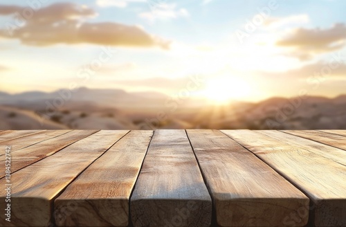 Empty wooden table outdoors at sunset photo
