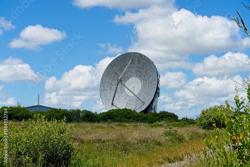 Fototapeta Naklejka Na Ścianę i Meble -  Helston England - 11 June 2024 - Satellite dishes on the Goonhilly Satellite Earth Station on the Goonhillly Downs on the Lizard Peninsula in Cornwall England