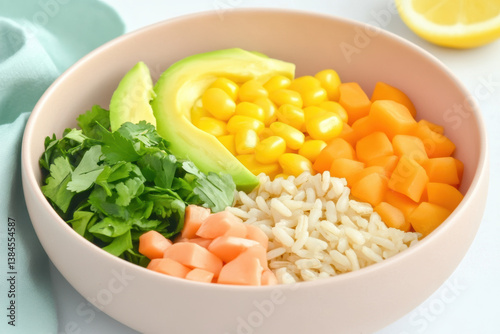 Fresh plant based recipes featuring rice, corn, avocado, and diced vegetables create healthy and delicious meal option
