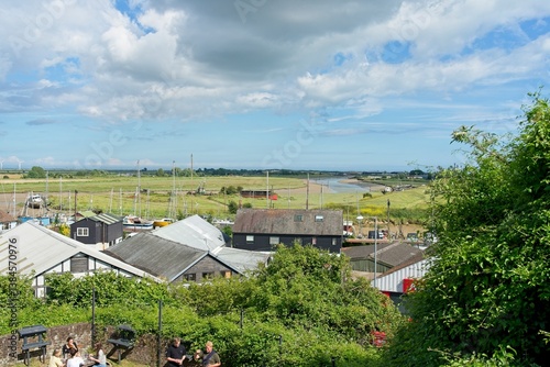 Rye England - 22 June 2024 - River Rother flowing to the picturesque town of Rye in East Sussex England photo